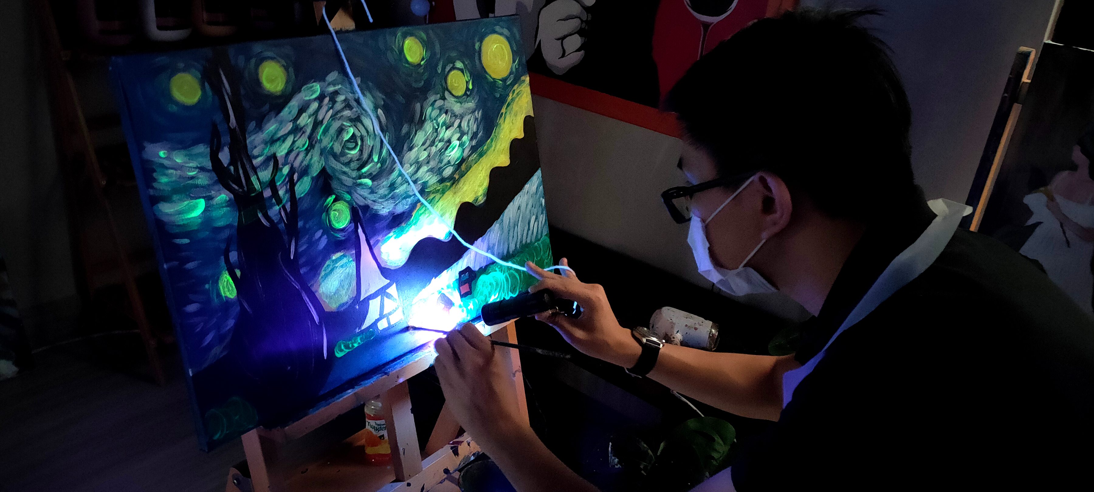 Sip Wine and Glow-in-the-dark Paint Art Experience - Photo 1 of 10