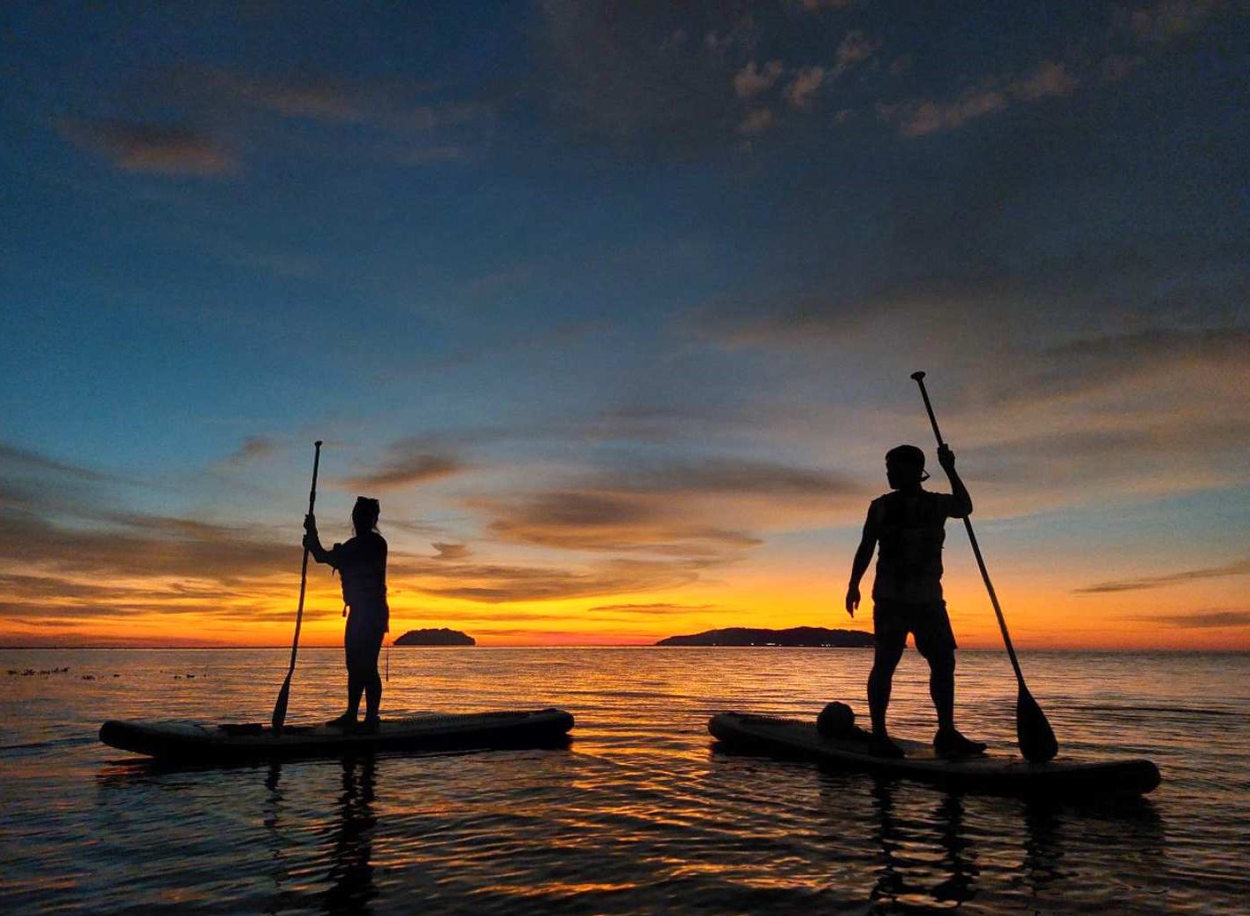 Sunrise & Sunset Stand Up Paddle Boarding Experience at Tanjung Aru Beach - Photo 1 of 8