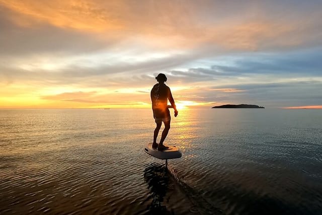 Sunset E-Foil Experience in Tanjung Aru Beach - Photo 1 of 6