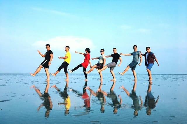 See the sky meet the earth at Sasaran Beach, where low tides result to reflective shallow waters!