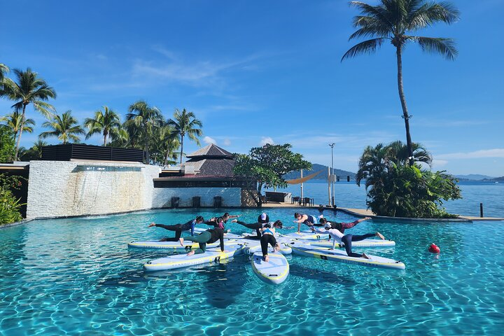 Zen & Splash: Stand-Up Paddleboard (SUP) Yoga in Tanjung Aru - Photo 1 of 6