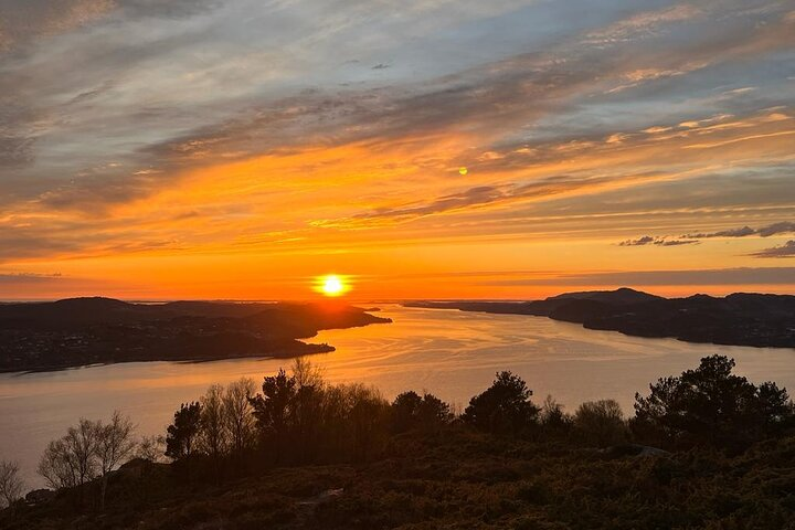 Experience the true Norwegian lifestyle with a neighborhood hike with a local. If you're lucky, an amazing sunset awaits you on the top! 