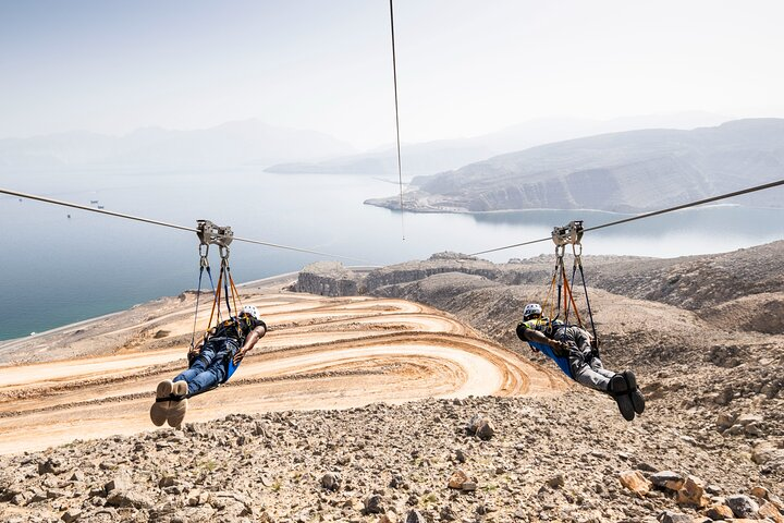 Admire breathtaking views of the picturesque surroundings as you zip down the 1,800-metre-long dual zipline.