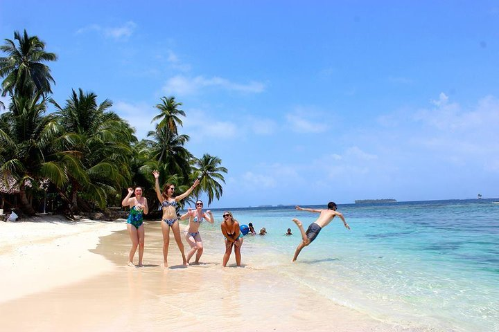 Day Tour guests playing on the beach