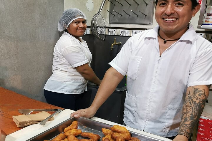 Local people selling yuca snacks