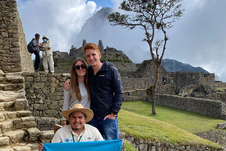 Erick, with a couple from Austria in the middle part of Machu Picchu 