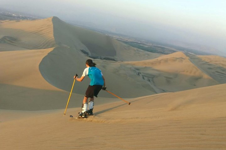 Skiing on dunes in Huacachina