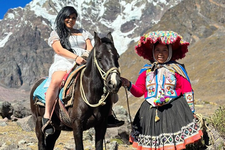 Immerse yourself in an unforgettable horseback riding experience at Ausangate Mountain while connecting with the local community.