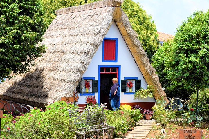 Santana's brightly colored A-frame houses, built in traditional style with natural stone and thatched roofs.