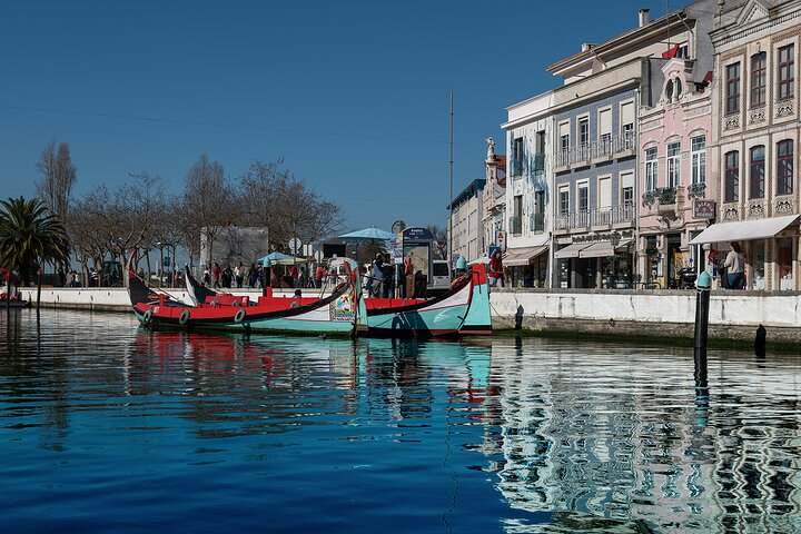 Aveiro Moments: Moliceiro Boat Tour through the Ria de Aveiro.