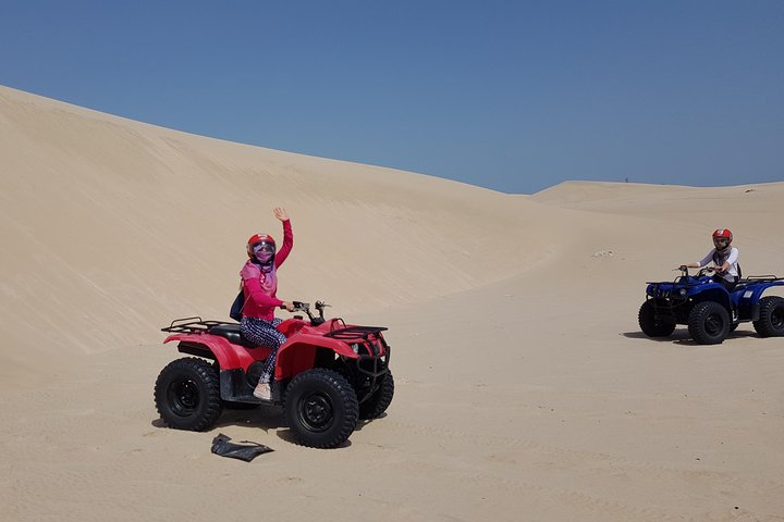 Ride ATV in the open Sand Dunes