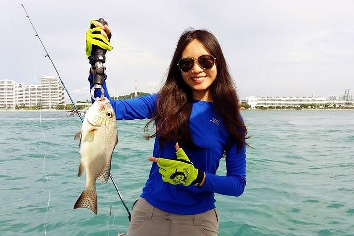 Lucky lady angler with her first catch ever