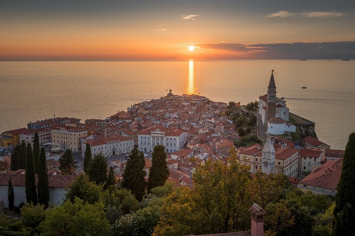 Sunset above the city Piran