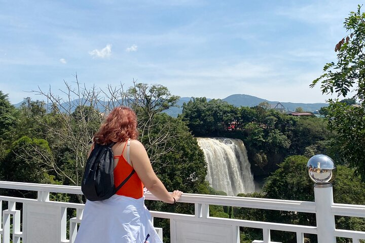 tourist view waterfall from the pagoda