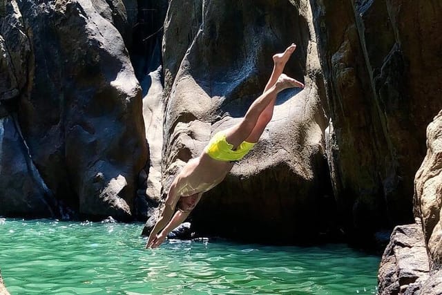 Jumping and Swimming at waterfall 