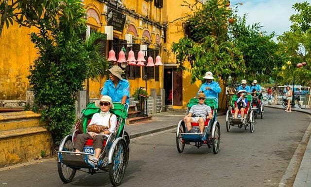 Hoi An Rickshaw Riding and Local Shopping Experience with Street Foods - Photo 1 of 6