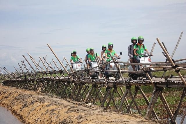 Hoi an vespa ride on bamboo bridge