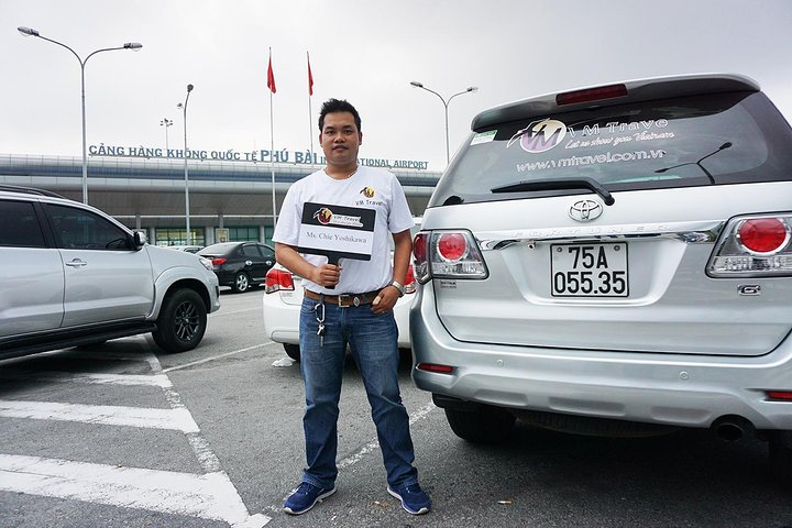 Welcome at airport with customer's name on board