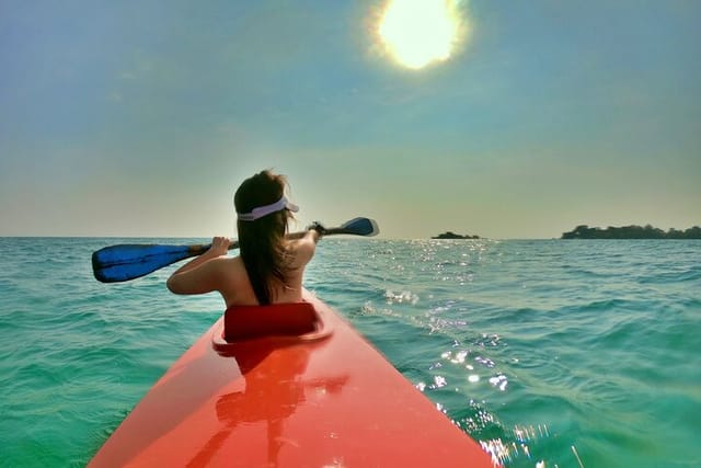 Paddling to Casuarina Beach from Half-moon Beach