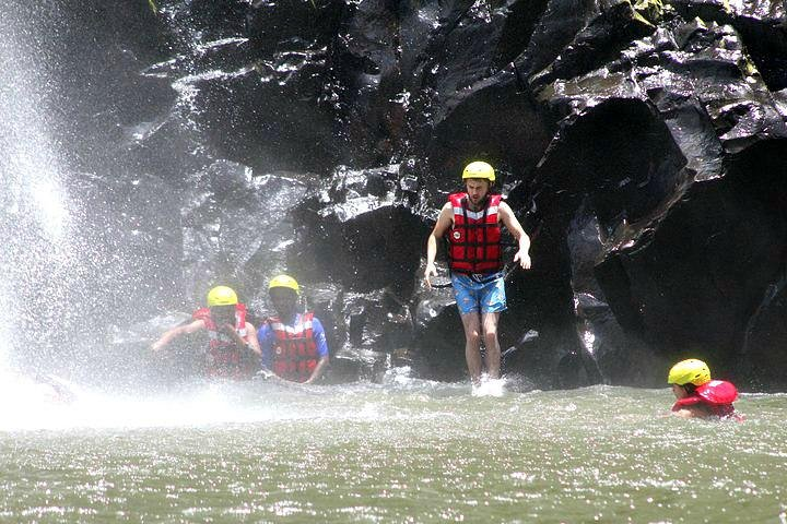 Swimming below the pools under the sprays of the Victoria Falls